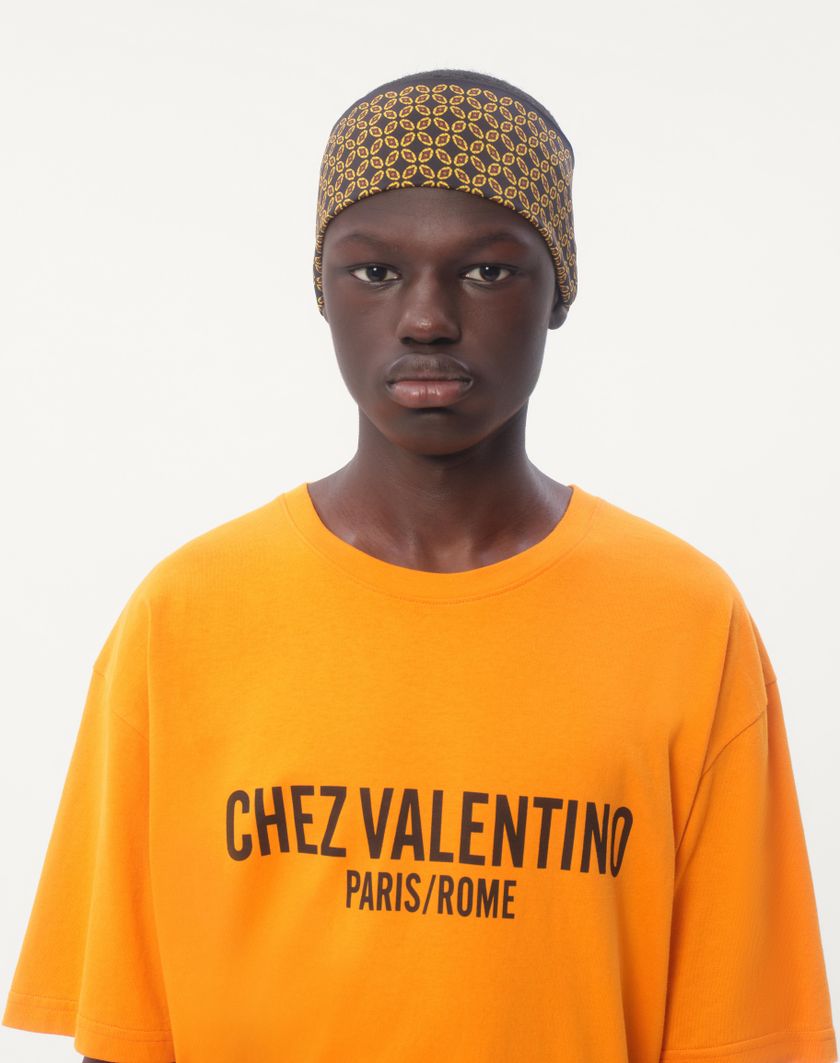 Valentino Handbags T-shirt In Cotone Con Stampa Chez Valentino per Uomo in Avorio | Valentino IT Presa